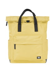 Label black roka london musta keltainen reppu