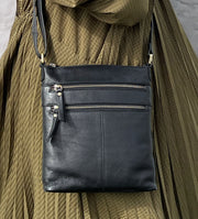 Treats Alicia musta olklaukku