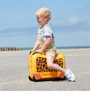 Samsoniten lasten matkalaukku ja lapsi