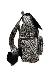 Marris kangas musta kultainen reppu kuvioitu