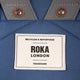 Roka London Finchley keskikokoinen reppu Burnt Blue vaaleansininen logo