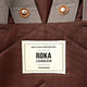 Roka London Finchley keskikokoinen reppu Chocolate ruskea logo