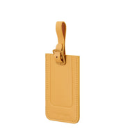 Ta Revolution keltainen Samsonite nimilappu