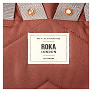 roka london iso reppu ruskea henna  merkki