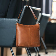 ruskea naisten nahkalaukku jen konjakki